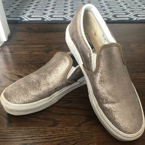 Metallic gold slip on Vans